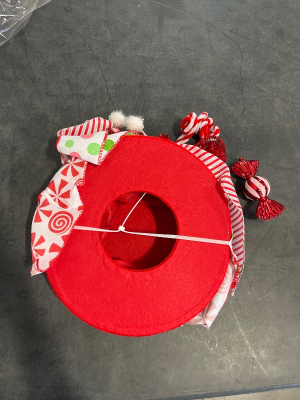 Photo 1 of Candy Cane Christmas Tree Topper, Large Red Tree Topper Hat with Candy Peppermint Bows Ribbon Ornament, Top Hat Christmas Tree Topper for Home Office Holiday Tree Decoration Xmas Gift