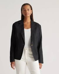 Photo 1 of Size Small Women' s black blazer featuring a lapel collar, long sleeves and a single-button closure.
