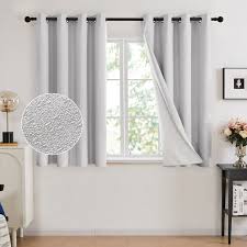 Photo 1 of Deconovo Contemporary White Solid Print Blackout Curtains for Bedroom and Living Room, Grommet Top, 52 x 54 inch, 2 Panels