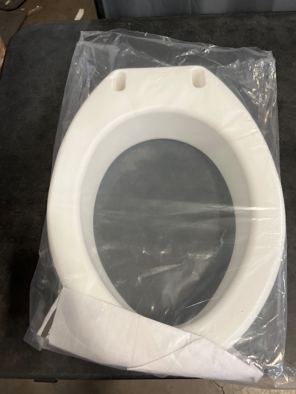 Photo 1 of Carex Toilet Seat Riser, Elongated Raised Toilet Seat Adds 3.5 inches to Toilet Height, for Assistance Bending or Sitting, 300 Pound Weight Capacity Toilet Riser