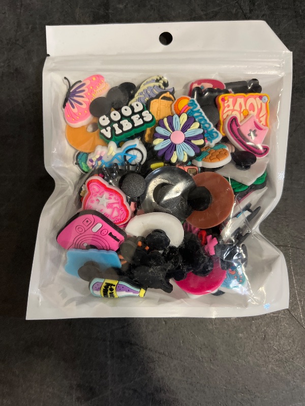 Photo 1 of 50 Pack Flower Shoe Decorations Charms for Clog Accessories Pins for Girls Women Cute Preppy Hippie Horse Pink Peace Butterfly Cowgirl Shoe Charms Party Favors