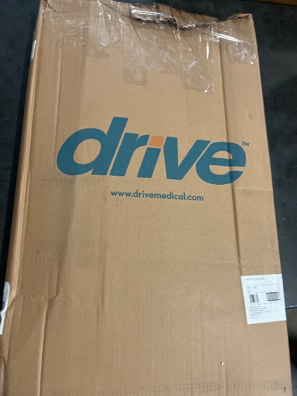 Photo 1 of Drive Medical Overbed Table with Wheels - Secure Height Adjustment for Comfort - Non Tilt Surface - Smooth Rolling Design - Home & Hospital Use - Woodgrain Laminate Top - Silver Vein