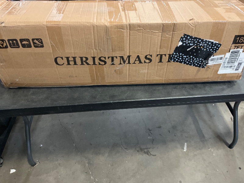 Photo 1 of 7 FT Artificial Skinny Christmas Tree,Unlit Blue Spruce Slim Pencil Xmas Tree with 1552 PE&PVC Mixed Branch Tips,Hinged Pine Tree with Metal Stand for Home Office Décor