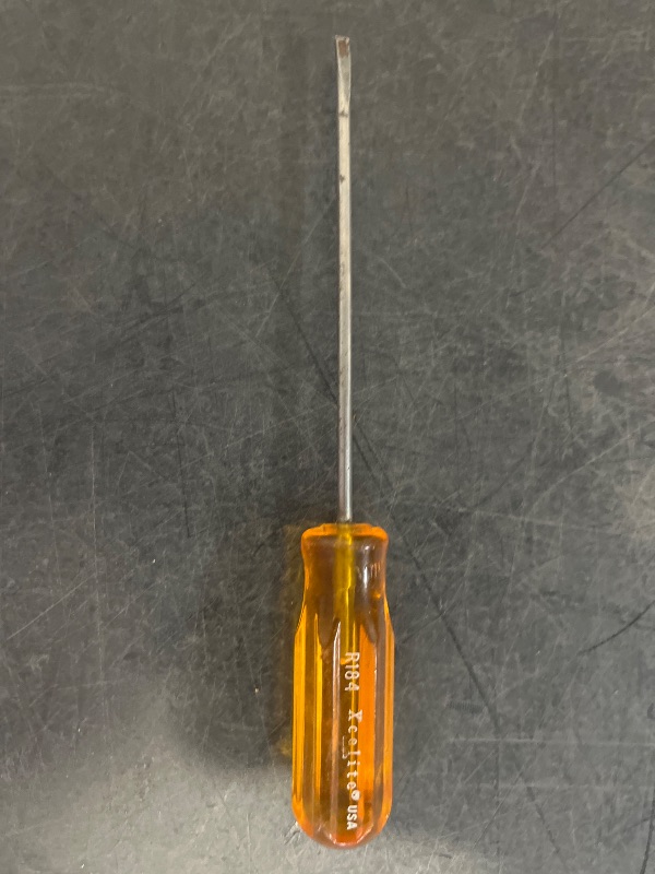 Photo 1 of Classic Series Round Blade Screwdriver, Amber Handle, Slotted Tip, 1/8 in. x 4 in., 6-5/8 in.