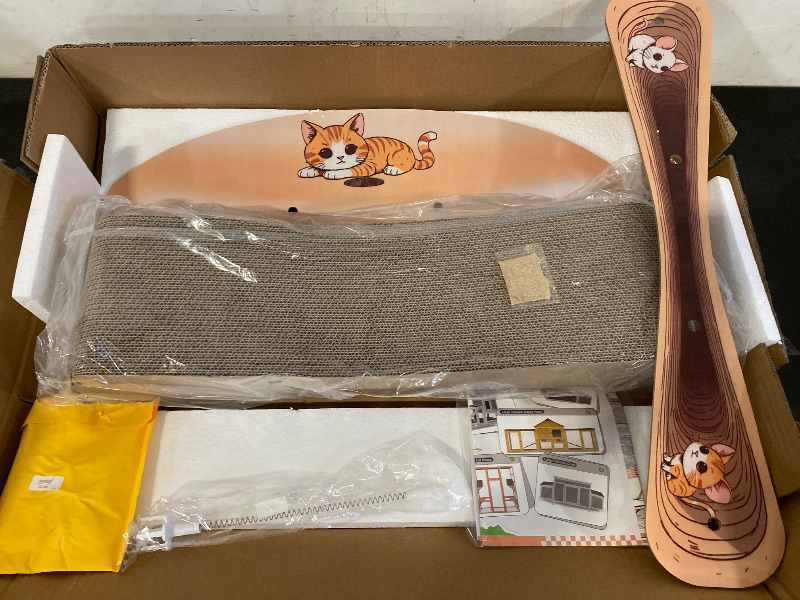 Photo 1 of Cat Scratcher Lounge Bed, Reversible 2-in-1 Cardboard Scratching Board, Durable Curved Cat Scratch Pad for Indoor Cats with Toy, Cartoon Pattern