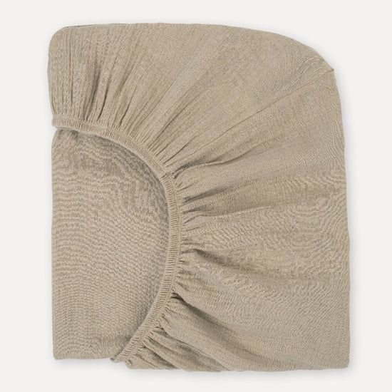 View 1 of 28" x 52" x 7" Latte Organic Muslin Cotton Crib Sheet