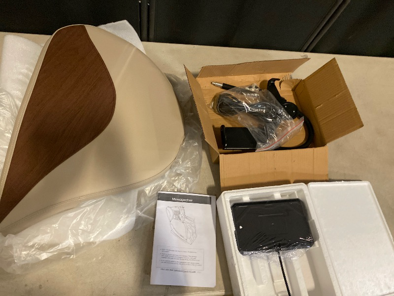Photo 1 of ITEM IS MISSING PARTS. UNSURE WHAT PARTS ARE MISSING.---------------------------------------Relax Full Body Massage Chair, Zero Gravity Shiatsu Massage Chair Recliner, Foot Massage, Bluetooth, Large Control Screen (Brown and Tan)