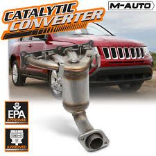 Photo 1 of OE Replacement Catalytic Converter 07-17 Jeep Compass, 07-08 Dodge Caliber 2.4L 4WD