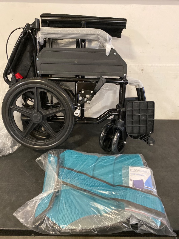 Photo 1 of Lightweight Transport Wheelchair 250lbs Weight Capacity, Folding Transport Wheelchair with Seat Belt & Hand Brake for Travel & Storage, Blue