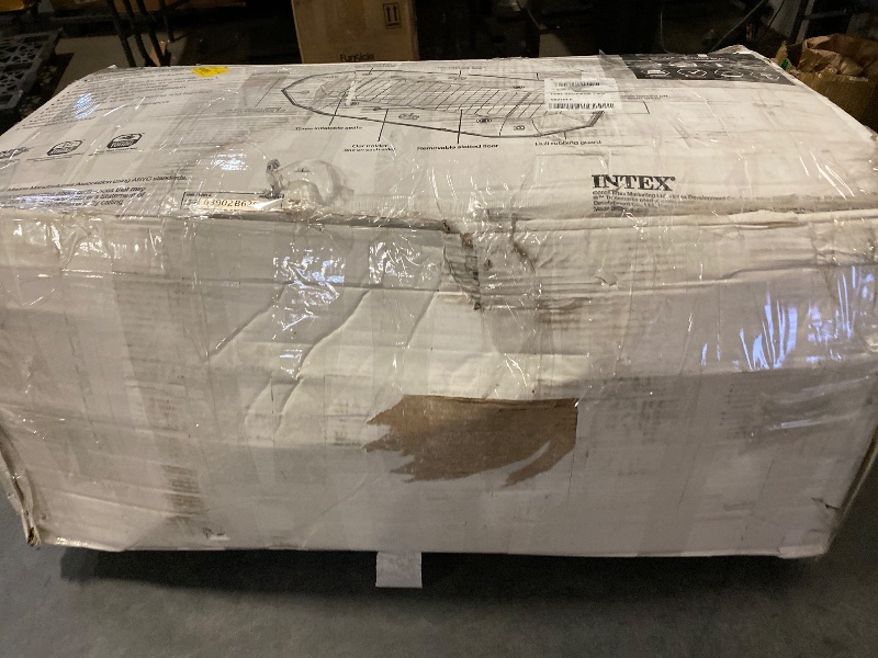 Photo 1 of Dirty + Used | Intex Mariner Inflatable Boat Series: Includes Deluxe Boat Oars and High-Output Pump – SuperTough PVC – Wear-Resistant Keel – Removable Fishing Rod Holders – Heavy Duty Grab Handle