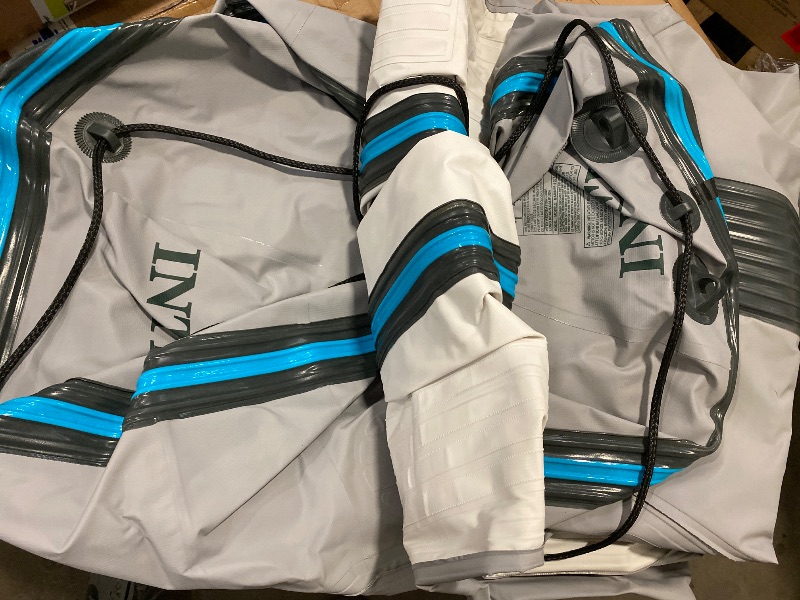 Photo 1 of Dirty + Used | Intex Mariner Inflatable Boat Series: Includes Deluxe Boat Oars and High-Output Pump – SuperTough PVC – Wear-Resistant Keel – Removable Fishing Rod Holders – Heavy Duty Grab Handle