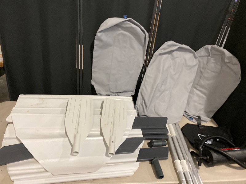 Photo 1 of Dirty + Used | Intex Mariner Inflatable Boat Series: Includes Deluxe Boat Oars and High-Output Pump – SuperTough PVC – Wear-Resistant Keel – Removable Fishing Rod Holders – Heavy Duty Grab Handle
