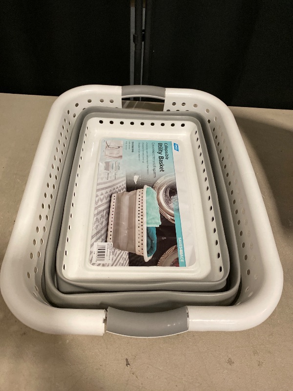 Photo 1 of Camco Collapsible Laundry Basket, Large, White/Gray - Pop Open Waterproof Plastic Bin with Handles for Home, Dorm, RV Storage | one side of Handle Broken on one side