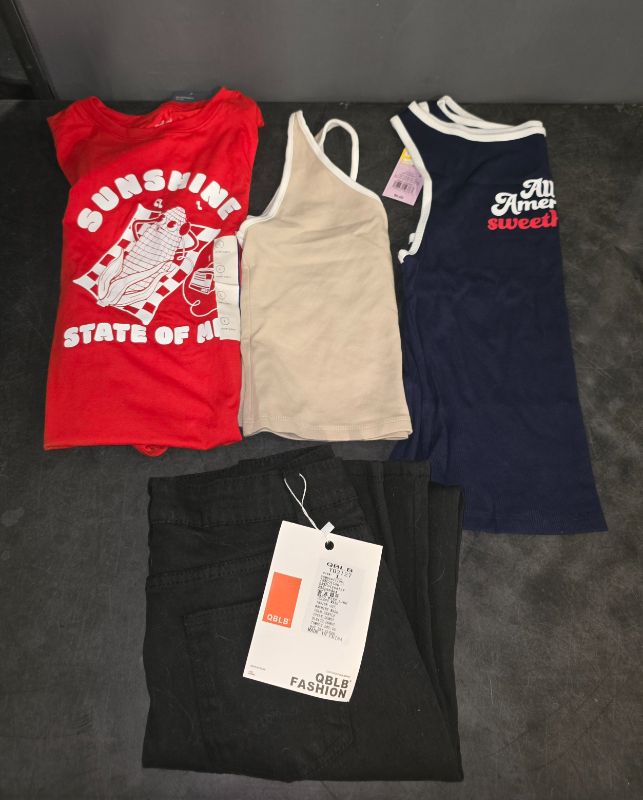 Photo 1 of 4 pack Large Clothing Bundle