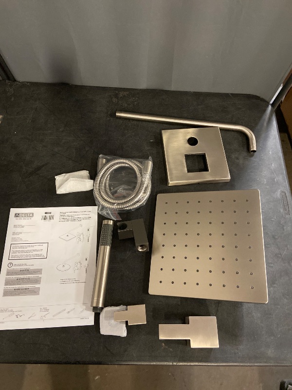 Photo 1 of Delta Modern 14 Series Square Rain Shower System Faucet Set, Rainfall Chrome Shower Head and Handle Set, Valve Trim Kit, 10 Inch, Chrome (Valve Not Included) missing some hardware