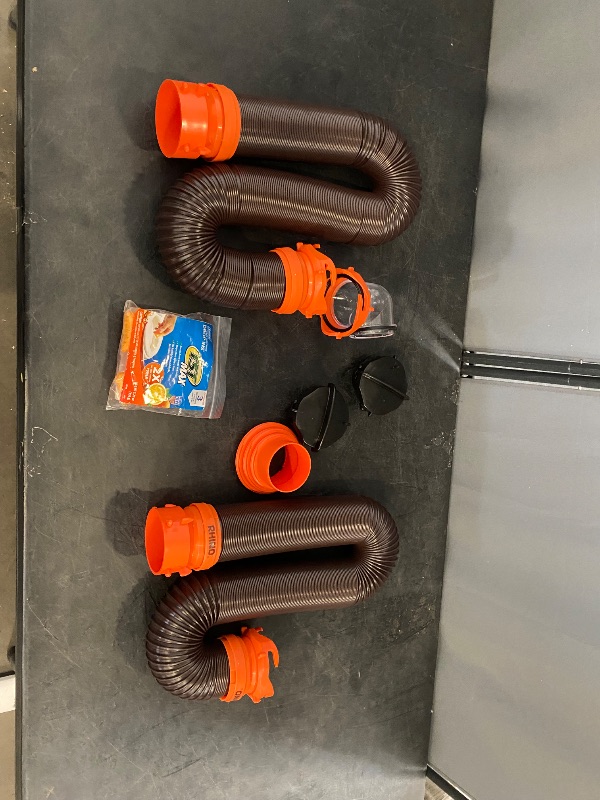 Photo 1 of Camco RhinoFLEX Camper/RV Sewer Hose Kit with 4-in-1 Adapter & Clear Elbow, Includes Caps for Convenient Storage, Fits 3? Slip & NPT Threaded Sewer Connections
