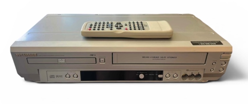 Photo 1 of SAMSUNG DVD/VCR COMBINATION PLAYER WITH REMOTE CONTROL