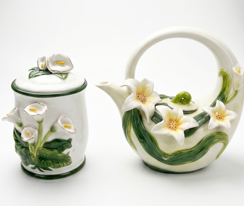 Photo 1 of 2 PORCELAIN KITCHEN ITEMS- CANISTER AND PITCHER