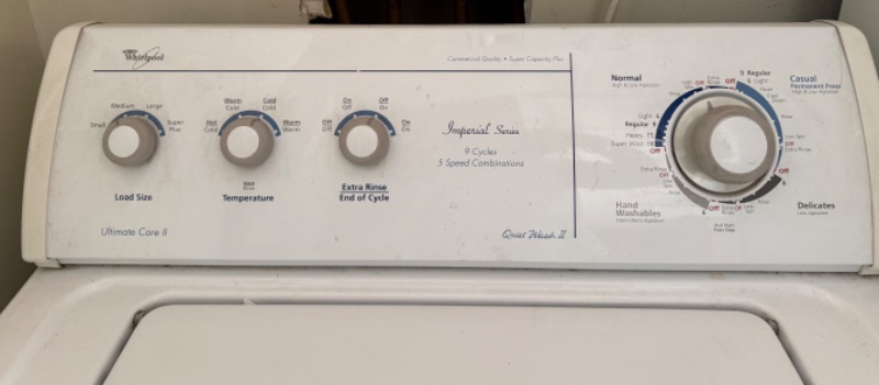 Photo 1 of WHITE WHIRLPOOL ULTRA CARE WASHING MACHINE