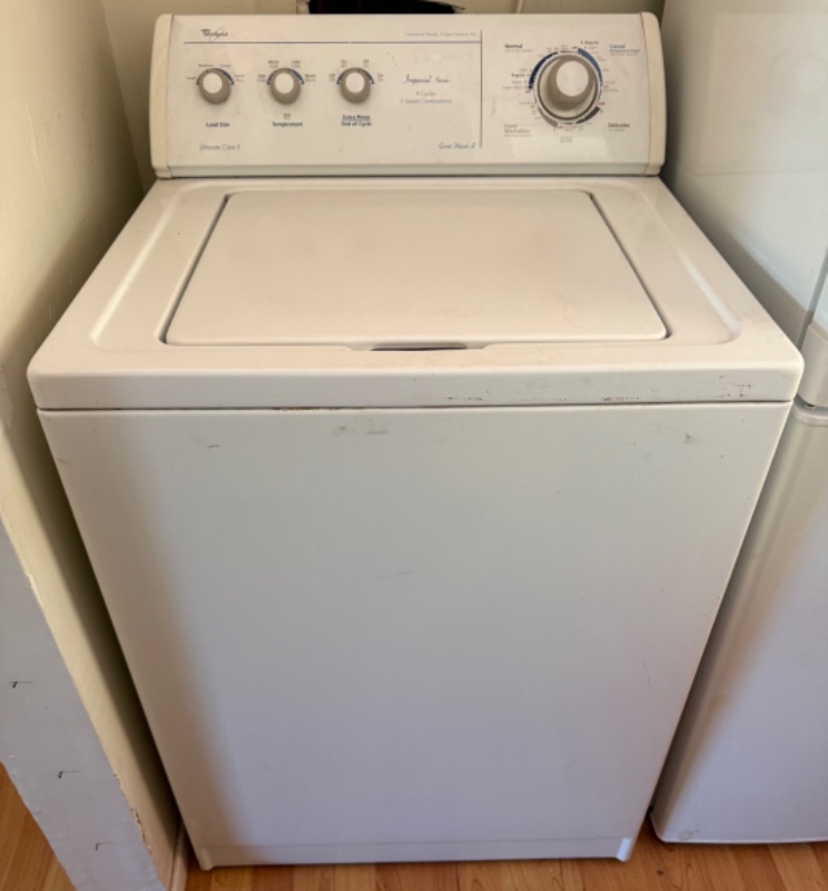 Photo 1 of WHITE WHIRLPOOL ULTRA CARE WASHING MACHINE