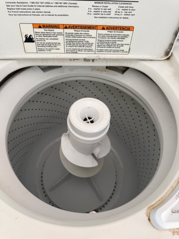 Photo 1 of WHITE WHIRLPOOL ULTRA CARE WASHING MACHINE