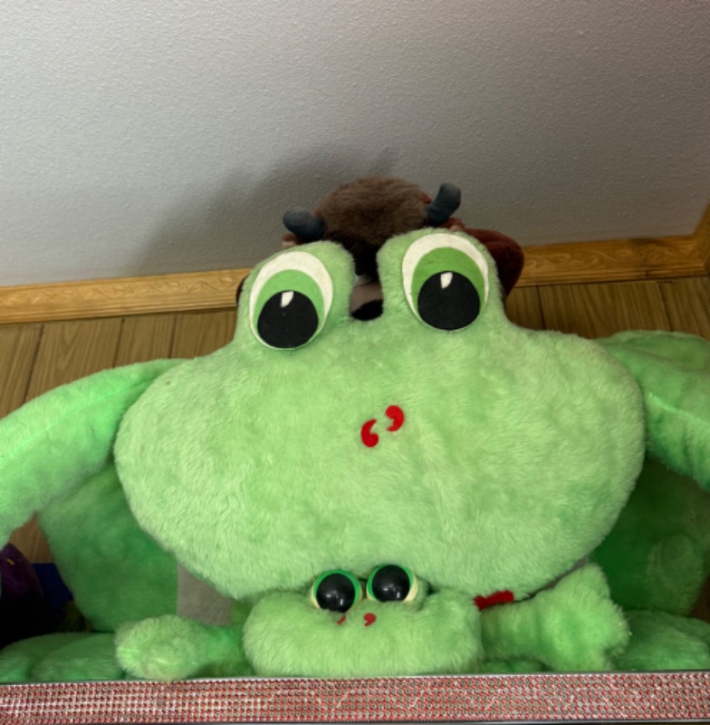 Photo 1 of LARGE STUFFED ANIMALS-FROG & PARROT