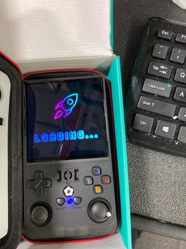 Photo 1 of **MISSING CHARGER**R36MAX Handheld Game Console, Built-in 4000mAh Battery, 4K HD 4" IPS Glass Screen, Supports 18000+ Classic Games, Linux-Based Retro Gaming Console (Black)