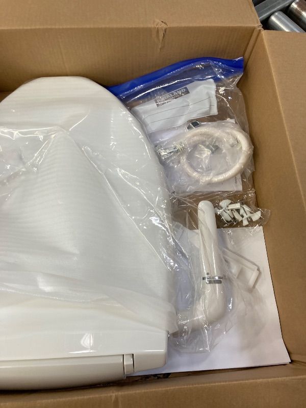 Photo 1 of **DAMAGED LATCH**Bidet Toilet Seat, Manual, Elongated