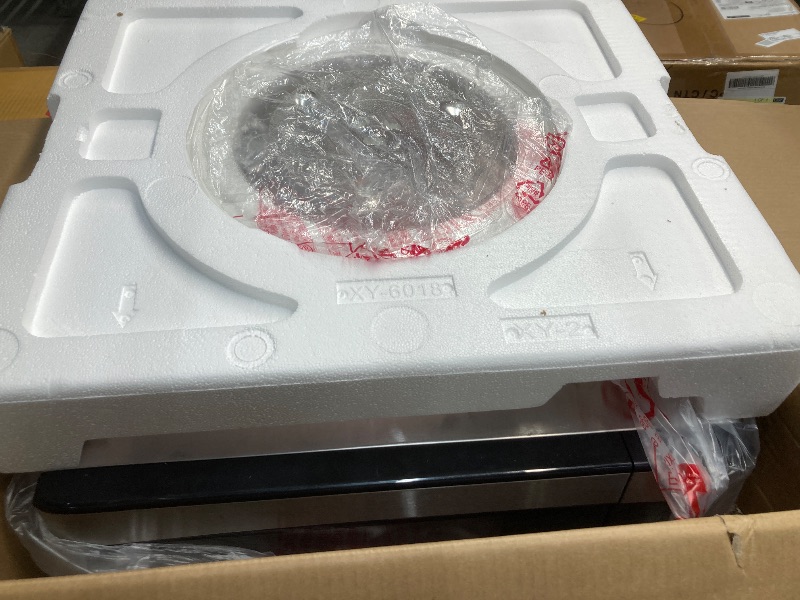 Photo 1 of ***DAMAGED -DENTED SIDE SELLING AS IS*** GE GCST10A1WSS 1.0 Cu Ft Convection Microwave Oven, 1050W Countertop Air Fry Microwave with Broil & Crisper Pan, Compact Stainless Steel Design