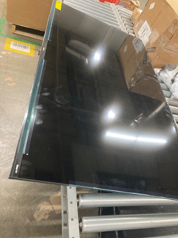 Photo 1 of ***NO RETOURN***Philips 60" QLED 4K UHD Roku Smart TV with 3 Year Coverage