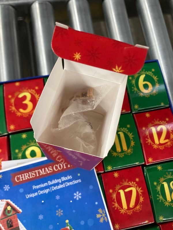 Photo 1 of ***USED, MISSING PIECES -SELLING AS IS ***Advent Calendar 2025 for Kids Boy Girl, 24 Days Surprise Christmas Cottage Building Blocks Christmas Countdown Calendar Gift Box with 1227 PCS Xmas Building Bricks Toy Decor for Teens Adults Women Men