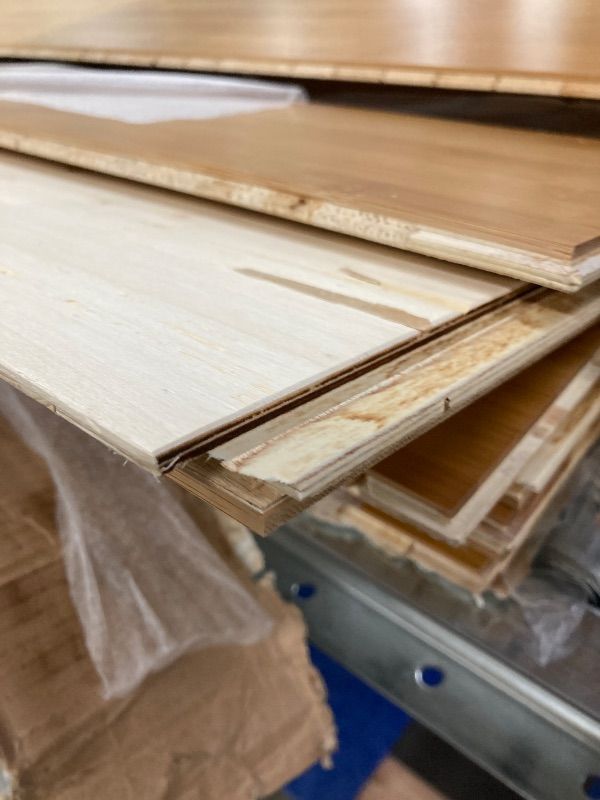 Photo 1 of ***DAMAGE -CORNERS EDGE -SELLING AS IS *** 539.7SQFT AMERIQUE Prefinished Engineered Bamboo Floor Glueless Click Horizontal Carbonized, Premium Grade, 7-1/2" X 9/16" X 86" with 4.5MM Top, 35.98SF/Ctn, 15Ctns