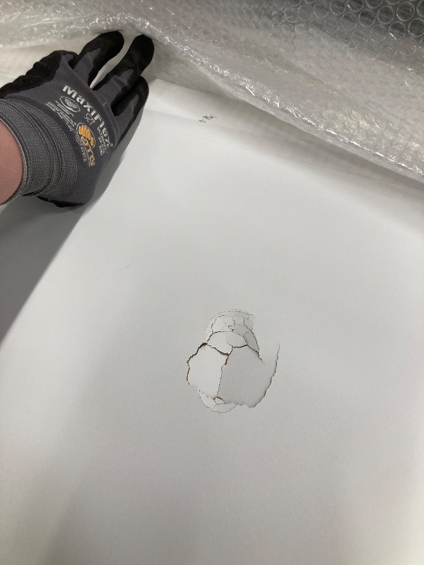 Photo 1 of *Hole in door* White door