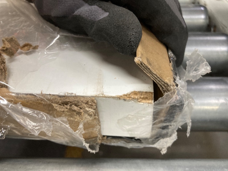 Photo 1 of *Hole in door* White door