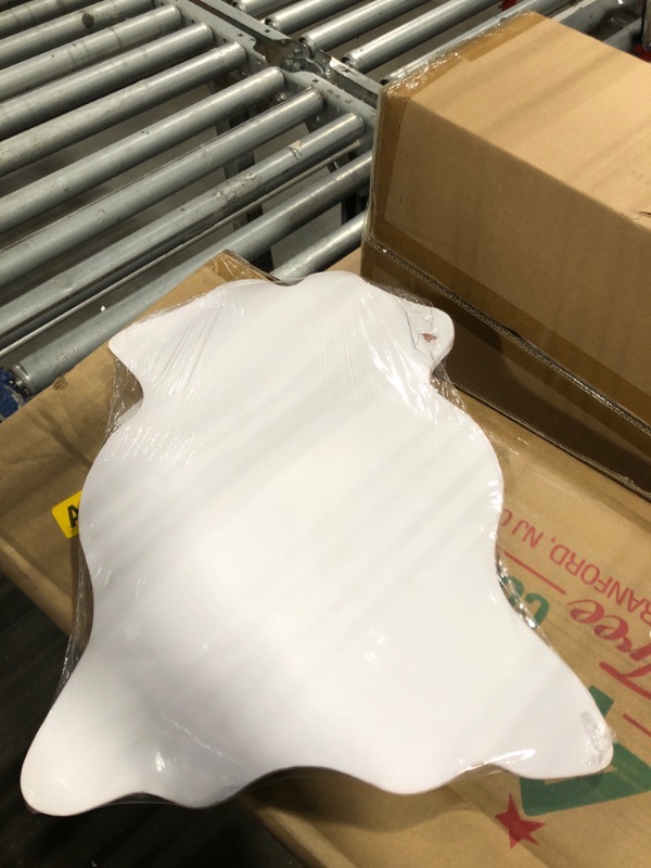 Photo 3 of HOMORE Cowhide Rug, 1x4 Rug Small Cow Print Rug for Bedroom Faux Cow Hide Animal Print Carpet for Living Room Office Table Western Decor, Khaki Brown