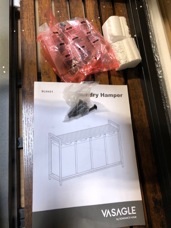 Photo 1 of ** MISSING HARDWARE**
VASAGLE Laundry Hamper, Laundry Basket, Laundry Sorter with 4 Pull-Out and Removable Bags, Shelf, Metal Frame, 4 x 10.6 Gallons (40 L), 45.7 x 13 x 28.4 Inches, Ink Black and Rustic Brown UBLH401B01