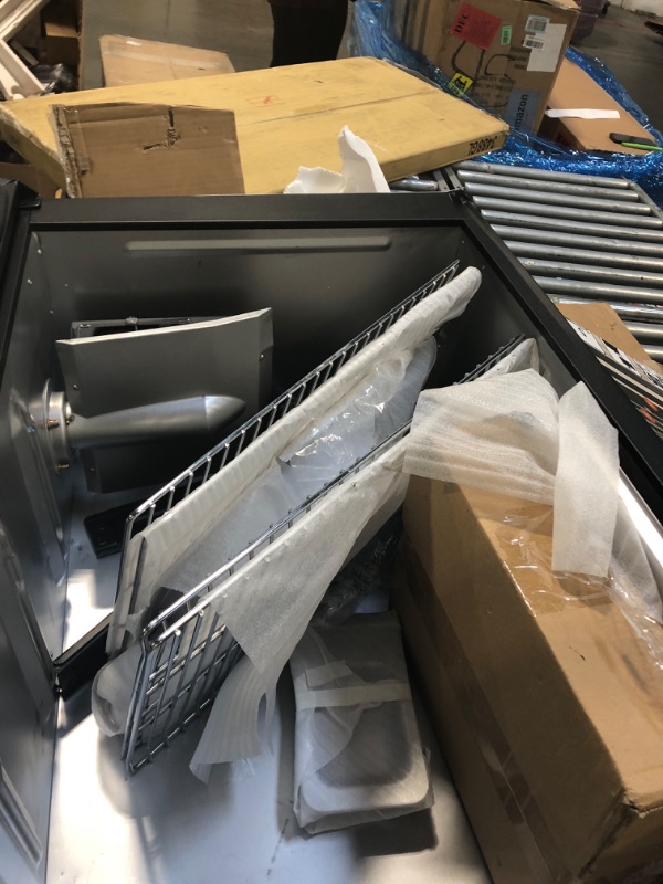 Photo 1 of ***HAS DENTS&******Masterbuilt® 40-inch Digital Electric Vertical BBQ Smoker with Leg Kit, Side Wood Chip Loader and 970 Cooking Square Inches in Black, Model MB20070122