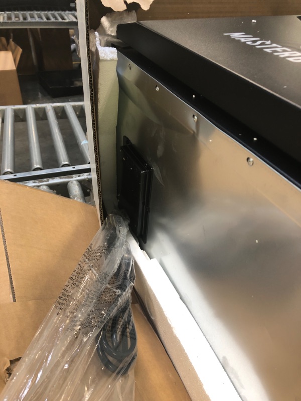 Photo 1 of ***HAS DENTS&******Masterbuilt® 40-inch Digital Electric Vertical BBQ Smoker with Leg Kit, Side Wood Chip Loader and 970 Cooking Square Inches in Black, Model MB20070122