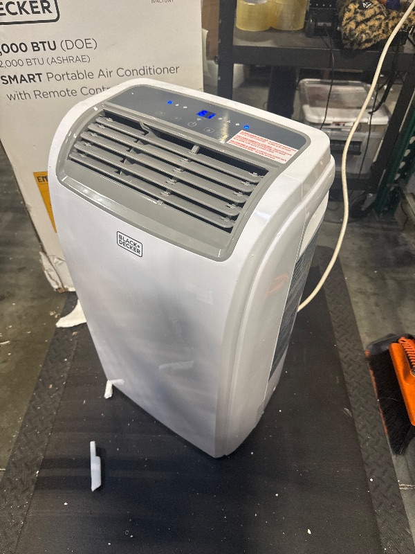 Photo 1 of *********TURNS ON PERFECTLY******* cools quickly****** BLACK+DECKER Portable Air Conditioner, 12,000 BTU (8,000 BTU SACC) for Rooms up to 550 Sq. Ft., Portable AC with Follow Me Remote Control and Window Kit, BPACT12WT, White