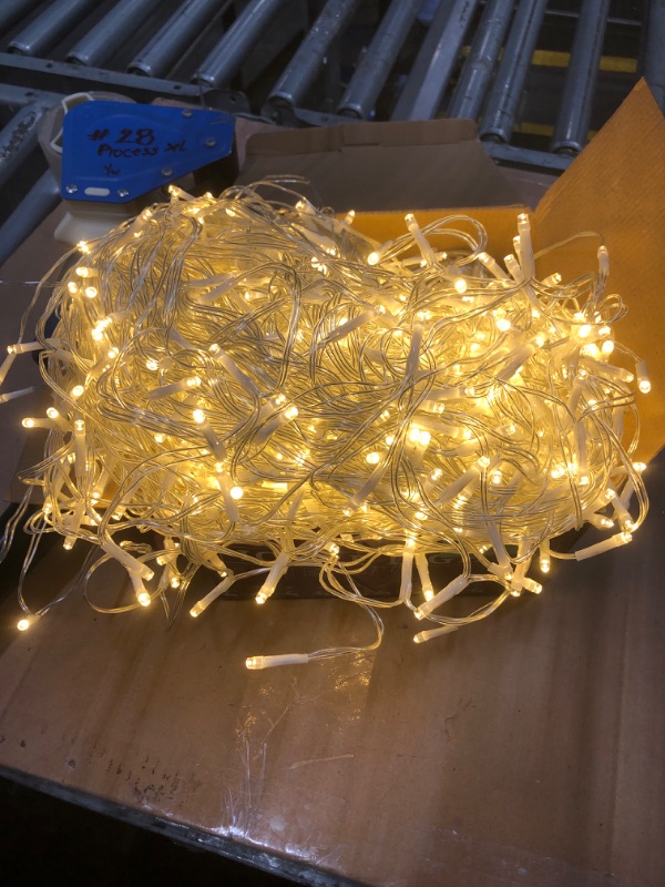 Photo 1 of 1216 LED Christmas Lights Outdoor Waterproof, 99 ft Icicle Lights for Outside, Plug in 8 Modes Timer Twinkle Lights for House Patio Xmas Porch Tree Yard Exterior Decorations, Warm White