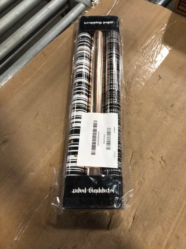 Photo 1 of MAYPLUSS Gift Wrapping Paper Roll - 17In x 120In Per Roll - Luxury Black and Gold Stripe Anniversary Present Gift Wrap Paper for Men Birthday, Christmas, Wedding, Graduation, Father's Day and Party