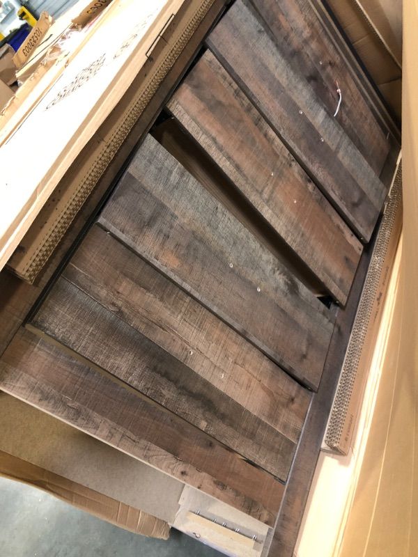 Photo 1 of **BROKEN PARTS** MISSING PARTS**Signature Design by Ashley Trinell Rustic 5 Drawer Chest of Drawers with Nailhead Trim, Warm Brown