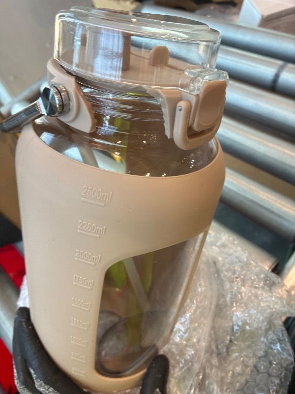 Photo 1 of **SEE PHOTOS**WINSA 84oz Glass Water Bottle with Stainless Steel Handle,2.5L Gallon Water Bottle with 2-IN-1 Straw Lid, Silicone Sleeve and Motivational Capacity Marker, Wide Mouth Water Jug For Gym, Workout, Pink