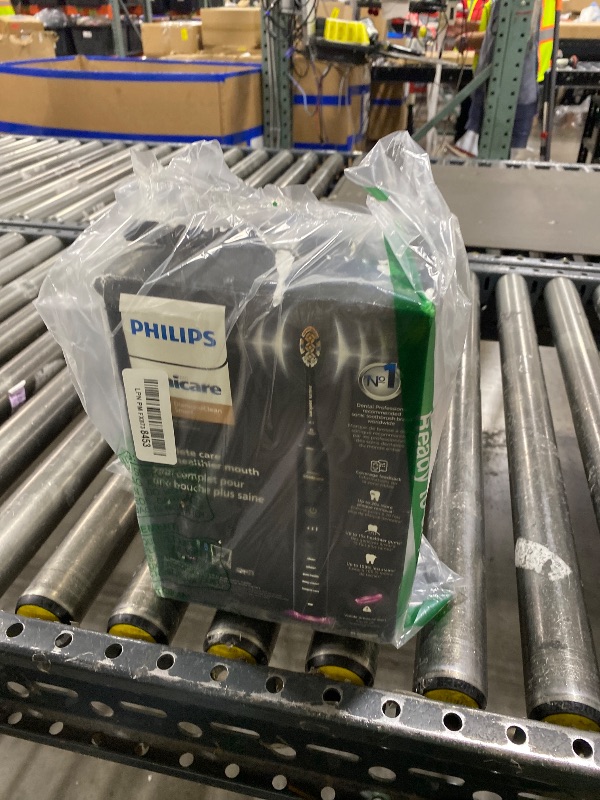 Photo 1 of Philips Sonicare DiamondClean Smart 9500 Electric Toothbrush, Sonic Toothbrush with App, Pressure Sensor, Brush Head Detection, 5 Brushing Modes and 3 Intensity Levels, Black, Model HX9923/11