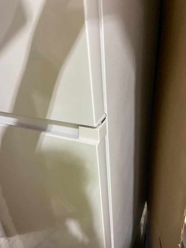 Photo 1 of Kenmore 33 in. 20.4 cu. ft Capacity Refrigerator/Freezer with Full-Width Adjustable Glass Shelving, Humidity Control Crispers, Ice Maker, ENERGY STAR Certified, White