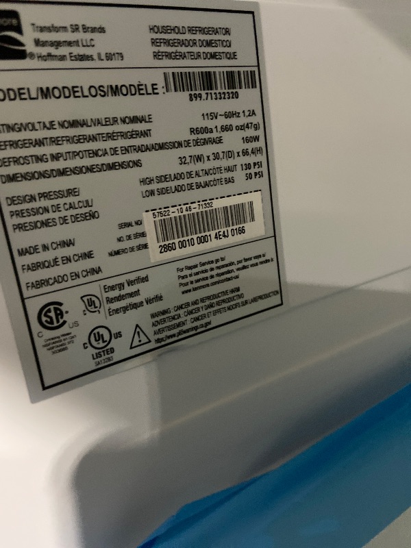 Photo 1 of Kenmore 33 in. 20.4 cu. ft Capacity Refrigerator/Freezer with Full-Width Adjustable Glass Shelving, Humidity Control Crispers, Ice Maker, ENERGY STAR Certified, White