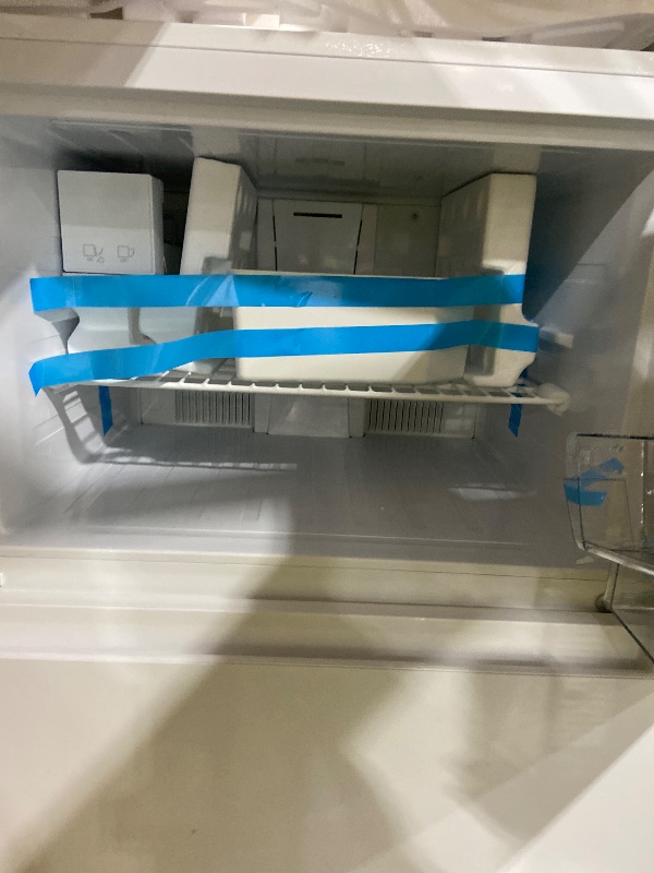 Photo 1 of Kenmore 33 in. 20.4 cu. ft Capacity Refrigerator/Freezer with Full-Width Adjustable Glass Shelving, Humidity Control Crispers, Ice Maker, ENERGY STAR Certified, White