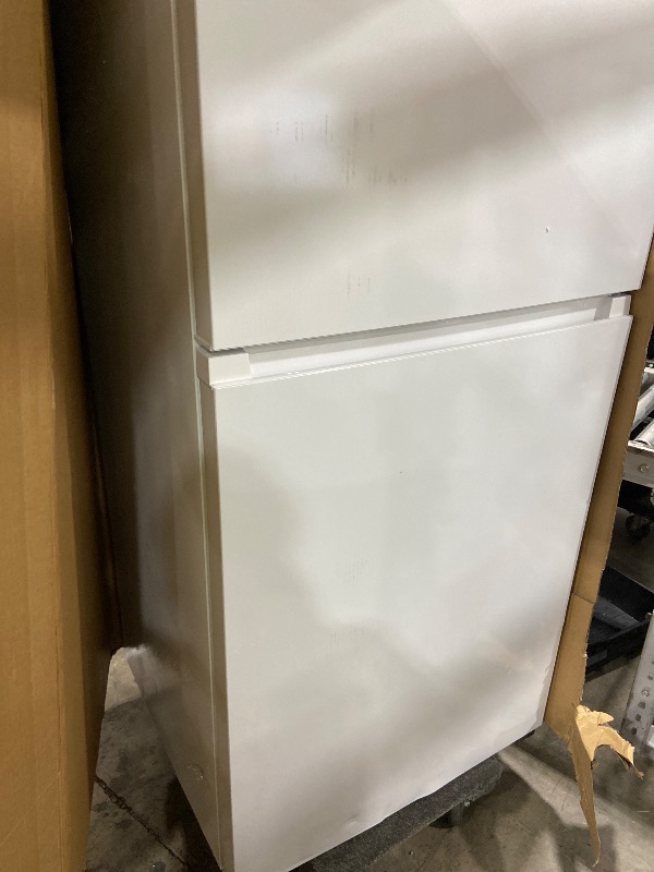 Photo 1 of Kenmore 33 in. 20.4 cu. ft Capacity Refrigerator/Freezer with Full-Width Adjustable Glass Shelving, Humidity Control Crispers, Ice Maker, ENERGY STAR Certified, White