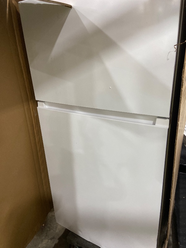 Photo 1 of Kenmore 33 in. 20.4 cu. ft Capacity Refrigerator/Freezer with Full-Width Adjustable Glass Shelving, Humidity Control Crispers, Ice Maker, ENERGY STAR Certified, White