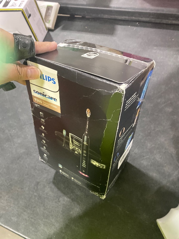 Photo 1 of Philips Sonicare DiamondClean Smart 9300 Electric Toothbrush, Sonic Toothbrush with App, Pressure Sensor, Brush Head Detection, 4 Brushing Modes and 3 Intensity Levels, Black, Model HX9903/15